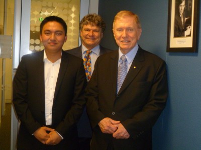 Front: Melchor Raval with the Honourable Justice Michael Kirby AC CMG, Rear: Paul Sudgen, Department of Business Law and Taxation