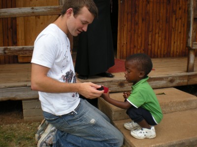 Andrew Asten in his work with the Oaktree Foundation