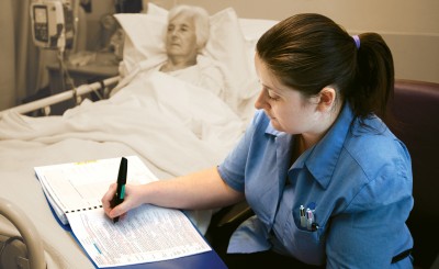 Monash alumna Rachel Thom using the digital pen at Frankston Hospital