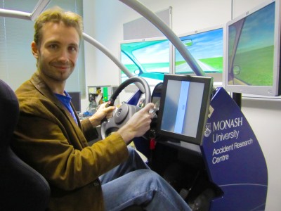 Robin Hutchinson in the portable driving simulator at MUARC