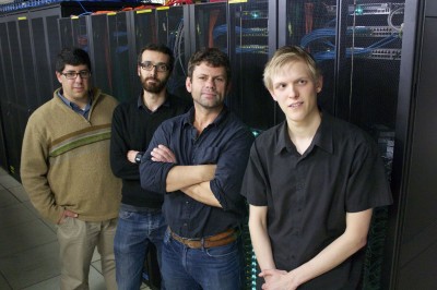 The research team pictured in front of supercomputer, Orchard: (l to r) Dr Itamar Kass, Cyril Reboul, Associate Professor Ashley Buckle and Ben Porebski