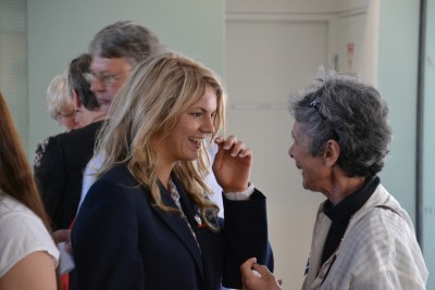 A Spanish-speaking senior and a student of Spanish at the event.